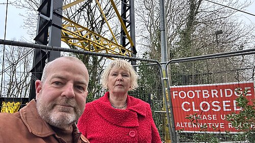 Cllr Andrew Varney and Cllr Jos Clark in front of the closed Sparke Evans Bridge